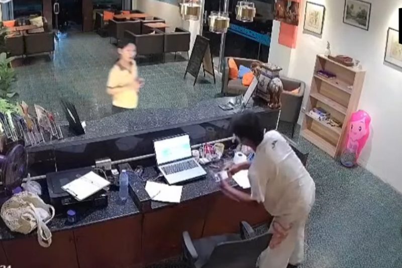 foreign man raids hotel desk at night