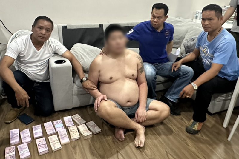 Chinese scam gang posing as police arrested